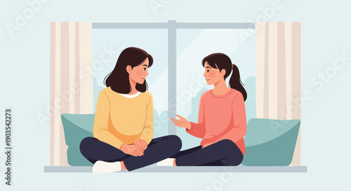 Two women sit facing each other near a window, sharing a moment of conversation