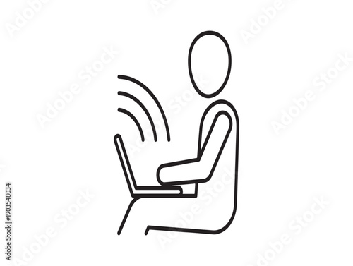 A person sitting and using a laptop with wireless internet connection