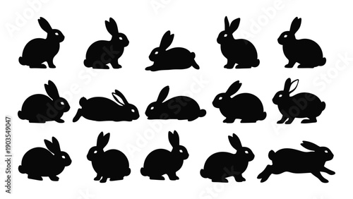 A collection of black silhouettes of rabbits in various poses and positions Vector
