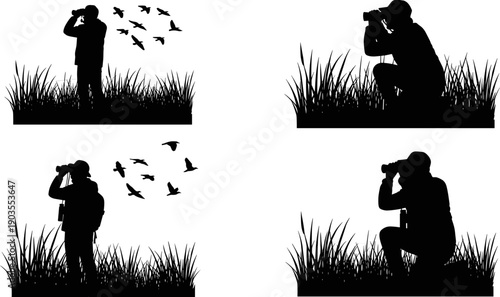 Birdwatcher and photographer silhouettes in tall grass using binoculars to watch flying birds, nature observation and wildlife photography concept.