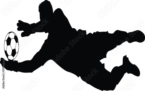 Silhouette of a goalkeeper diving to catch a soccer ball in mid-air.