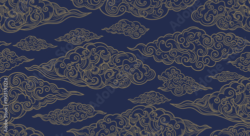Intricate gold pattern on dark blue background with swirling designs.