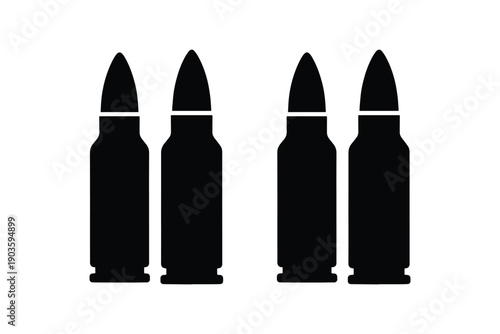 Four bullets lined up in two pairs, representing ammunition and firearm use