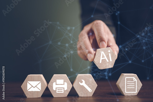Hand placing AI symbol block among business workflow icons representing artificial intelligence
