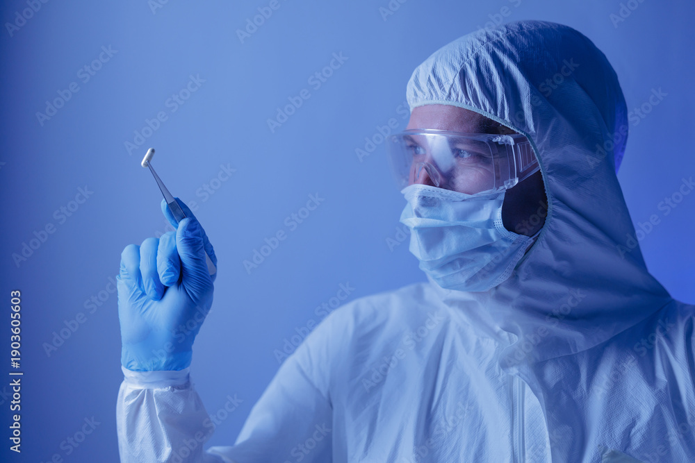 Naklejka premium Medical production, Scientist hold pill capsules for control medicine quality in pharmaceutical factory, blue light