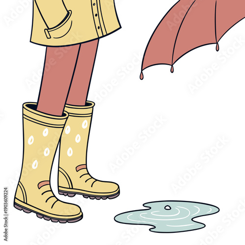 A person standing in the rain with a puddle forming near their boots