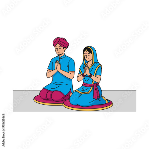 Indian Couple in Traditional Attire Praying with Namaste Gesture