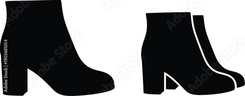 Pair of black ankle boots, shoes with a block heel. 