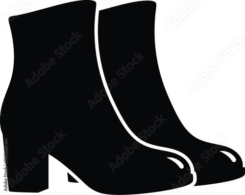Pair of black ankle boots, shoes with a block heel. 