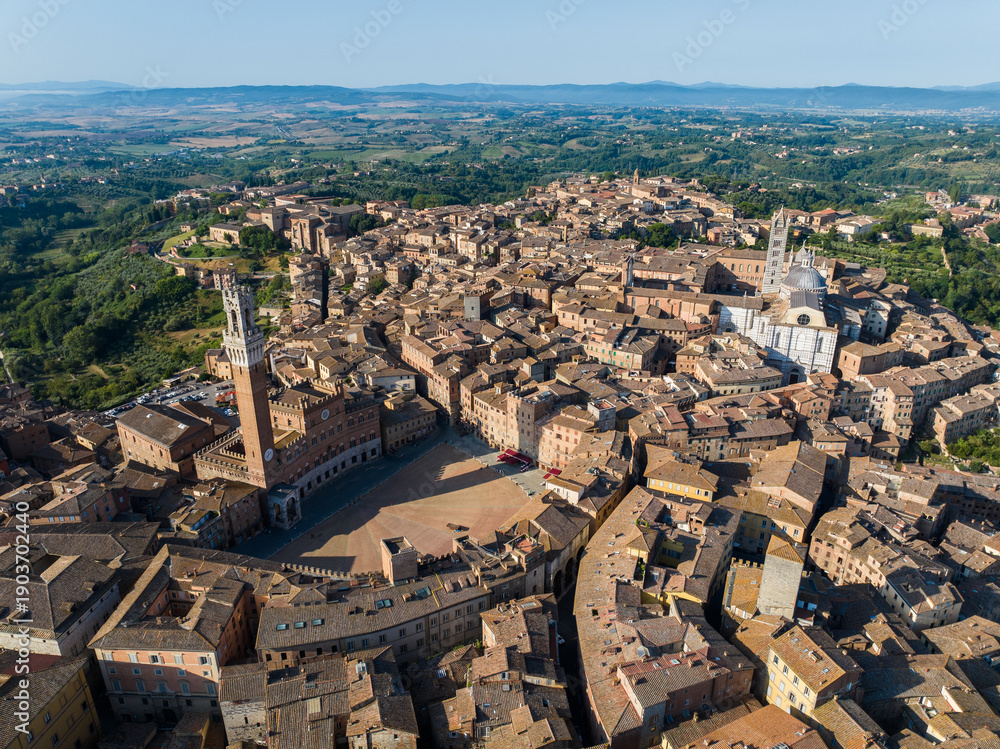 Fototapeta premium Aerial view of Siena, Piazza del Campo (Campo square), Palazzo Publico and Torre del Mangia (Mangia tower), Tuscany, Italy