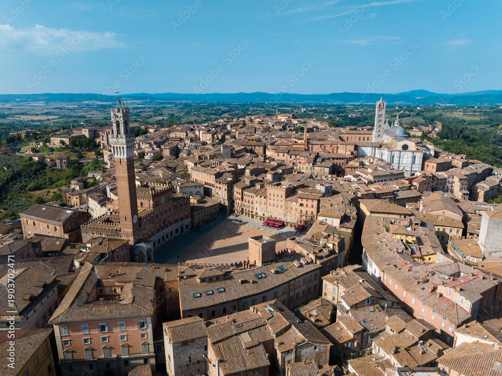 Fototapeta premium Aerial view of Siena, Piazza del Campo (Campo square), Palazzo Publico and Torre del Mangia (Mangia tower), Tuscany, Italy