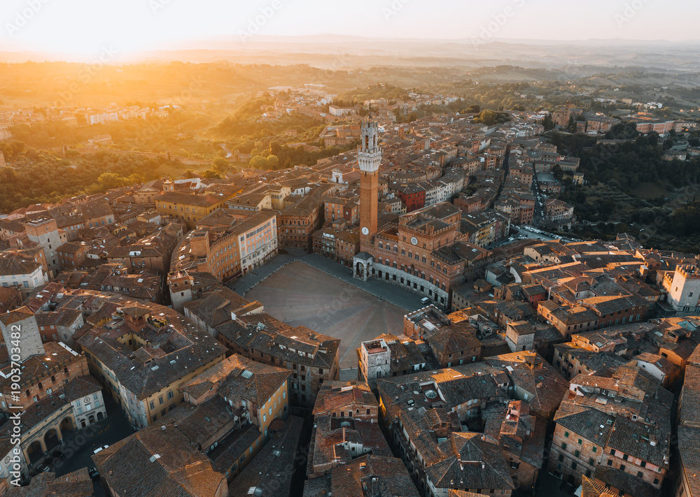 Fototapeta premium Aerial View of Torre del Mangia and Piazza del Campo at Sunset, Siena, Tuscany, Italy