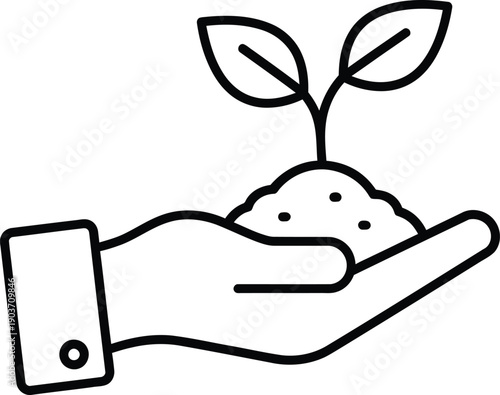 A hand holding a small plant with two leaves growing out of soil