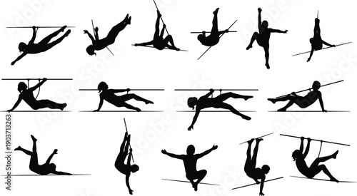 Black silhouettes of people performing aerial acrobatics on pole