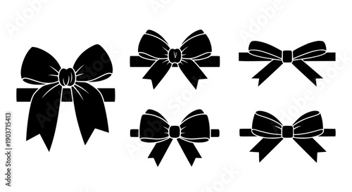 Decorative black ribbon bows and elegant gift wrap elements for festive celebrations and luxury packaging designs.