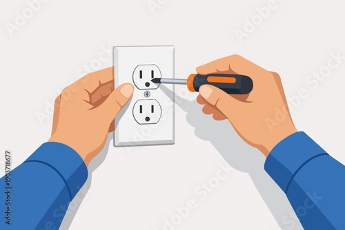 Hands installing or repairing an electrical power outlet with a screwdriver
