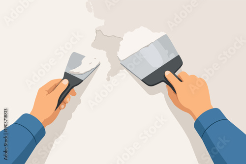 Hands using putty knives to repair and plaster a damaged wall surface