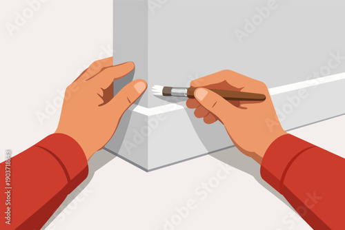 Hands painting white trim with a brush, home renovation diy project