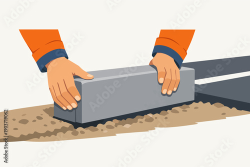 Construction worker hands installing concrete curbstone along a newly paved road