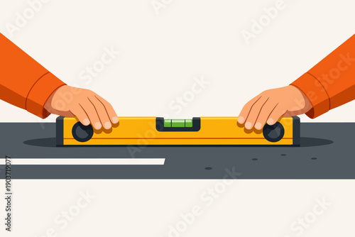 Worker hands using a spirit level checking horizontal surface for perfect balance