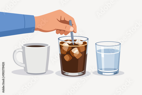 Hand mixing iced coffee with spoon, beside hot coffee mug and glass of water