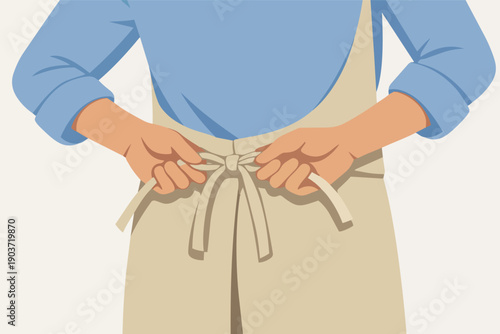 Person tying apron strings on back, preparing for cooking or baking activity