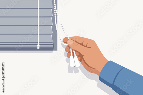 Hand pulling blinds cord, adjusting window covering for light and privacy control