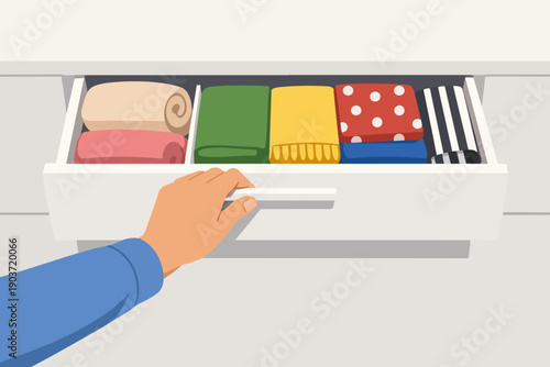 Hand opening drawer with neat folded clothes illustration for home organization