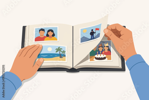 Hands turning pages of a photo album, remembering past life experiences and memories