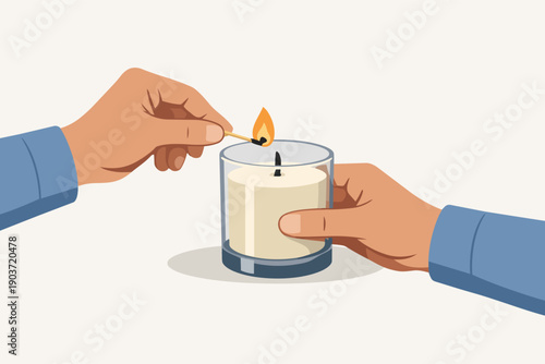 Hands lighting a scented candle with a match, creating calm and ambiance