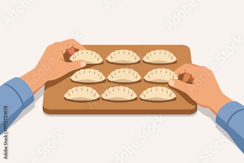 Hands arranging raw dumplings on a wooden board, showcasing homemade food preparation