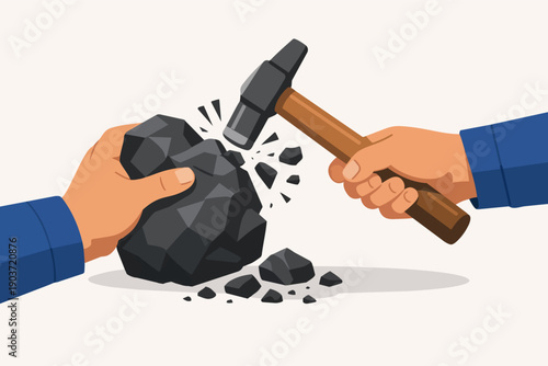Hands hitting coal with a hammer, extracting energy mineral ore