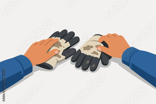 Worker wearing dirty safety gloves, symbolizing hard work and manual labor