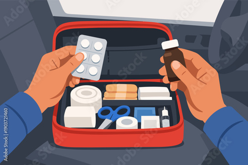 Person holding medicine over car first aid kit, preparing for emergency travel
