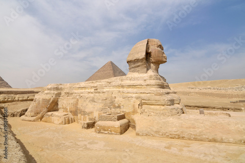 The pyramid of Khafre or of Chephren with a statue of a sphinx in the foreground