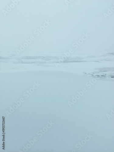 A frozen sea with snow