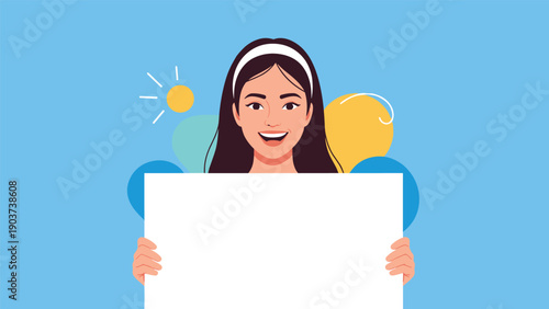 Cheerful young woman with long dark hair holds a blank white rectangular banner for message or text against a blue background.