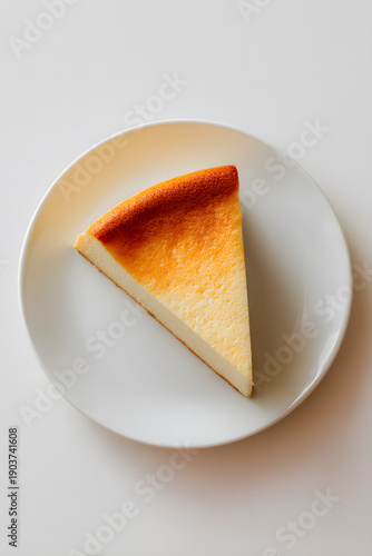 Wallpaper Mural Slice of cheescake on plate. AI generated Torontodigital.ca