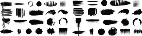 Collection of various black brush strokes and marks on a white background