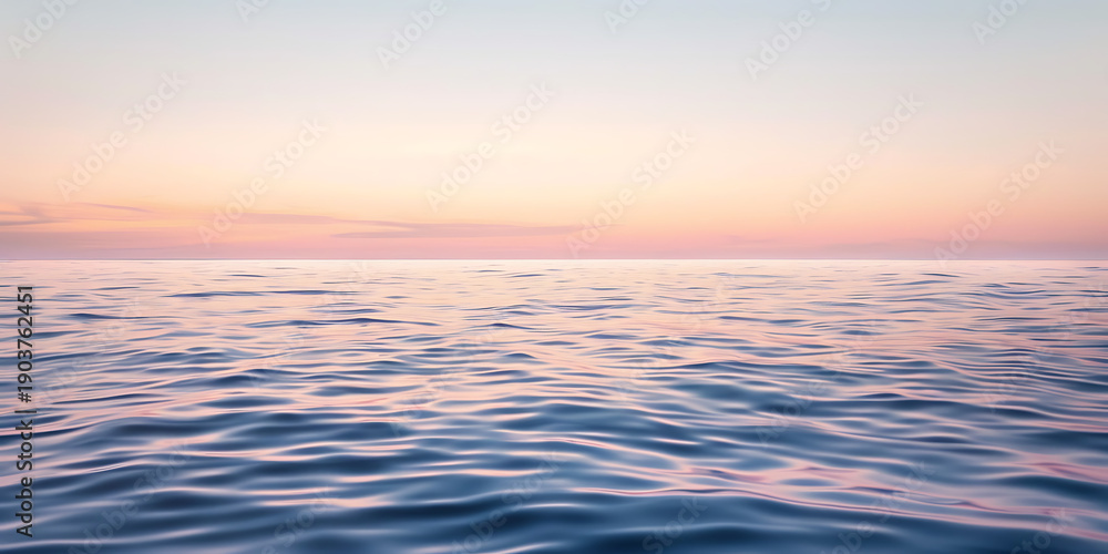 Obraz premium Calm Ocean Waves at Pastel Sunset