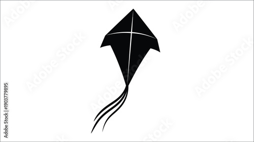 A black kite with a long tail against a white background silhouette