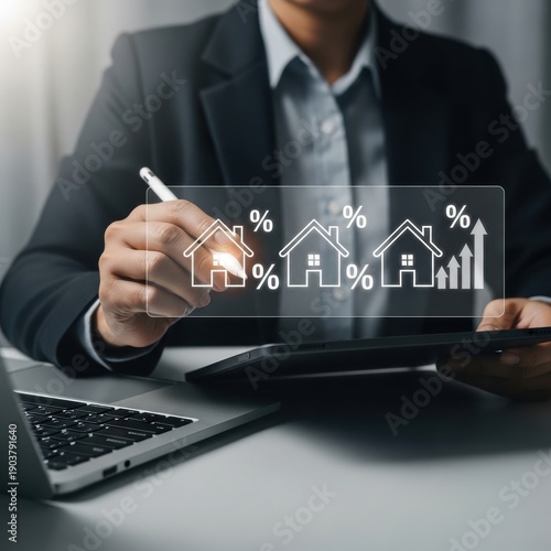 Businessman analyzing financial data on a tablet with a transparent screen