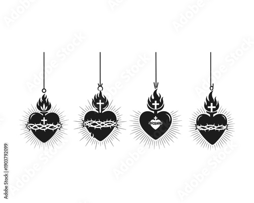 Four ornate heart shaped earrings with thorns and spikes
