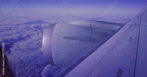 Airplane Engine View Above Clouds