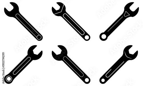 Collection of various wrenches arranged symmetrically in a circular pattern on a clean background