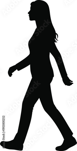 Silhouette of a woman in business attire walking confidently forward with her left leg extended and arms swinging naturally