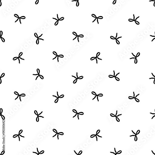 Minimalist seamless pattern with small black hand-drawn bows on a white background. Elegant coquette aesthetic for chic textile and decor.