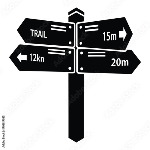 Black and white trail direction signpost with distances in meters and kilometers desi