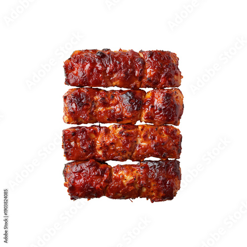 Juicy Barbecue Meat Rolls Served on a White Plate for a Tasty Meal During a S...