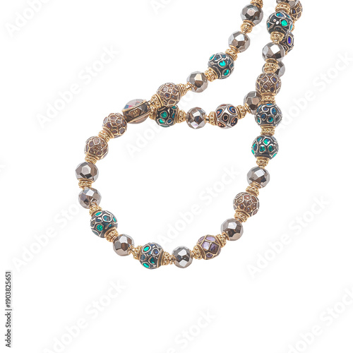 Black Beads Arranged in a Circular Shape on a White Background